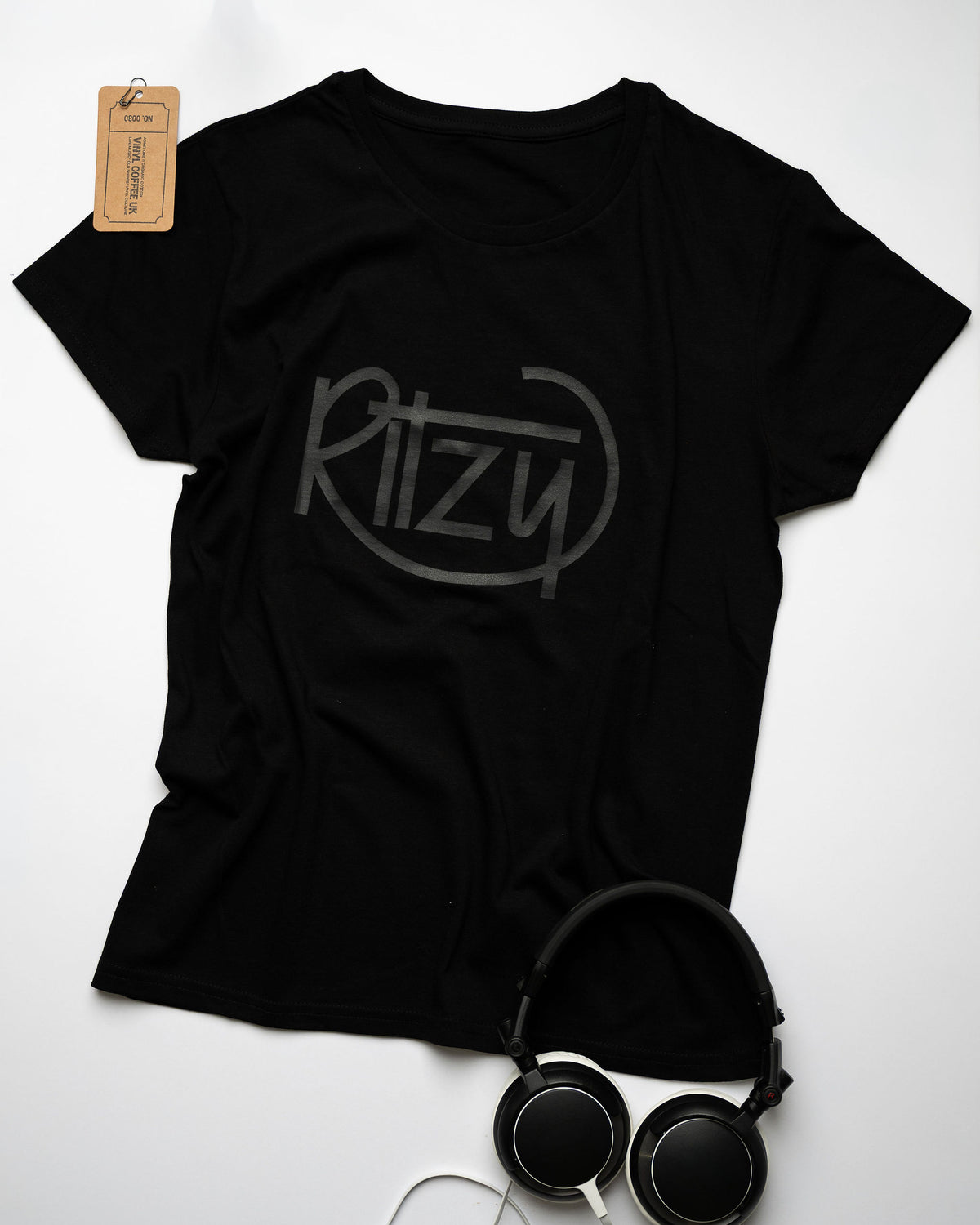Women's black Ritzy T-shirt with a subtle tonal print, headphones and brand tag.